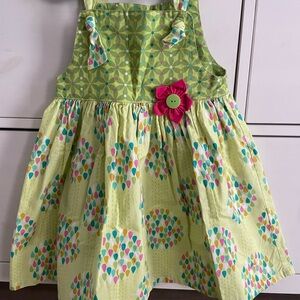 Vibrant Green Kids Dress with Pink Floral Accent